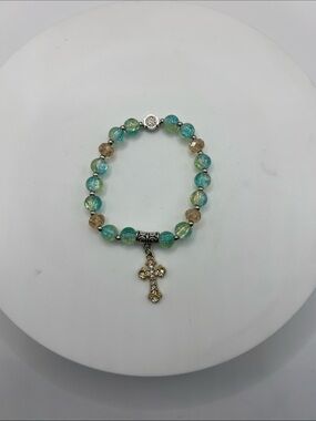 753. Beaded Aqua and Gold Cross Charm Stretch Bracelet 6 1/2”